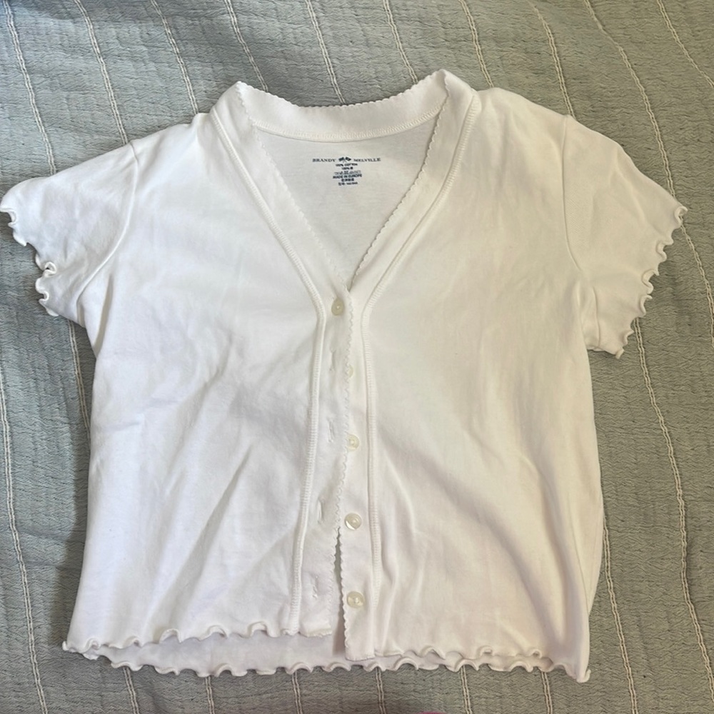 white ruffle button up brandy melville top